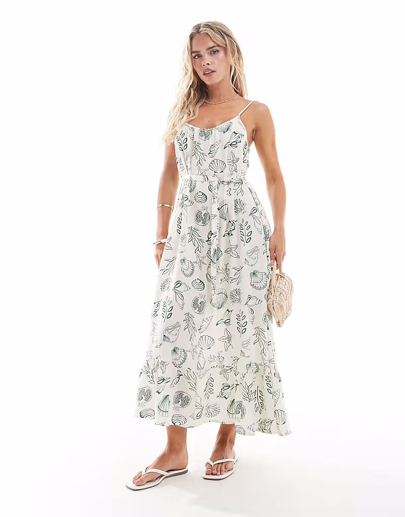 Платье-комбинезон Vero Moda Petite Easy длиной до щиколотки с принтом в морском стиле
Платье-комбинезон Vero Moda Petite Easy длиной до щиколотки с принтом в морском стиле