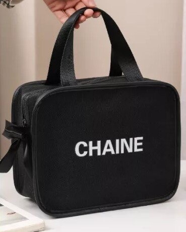 Элегантная большая косметичка с бантом-цепочкой, черная, inna
Элегантная большая косметичка с бантом-цепочкой, черная, inna