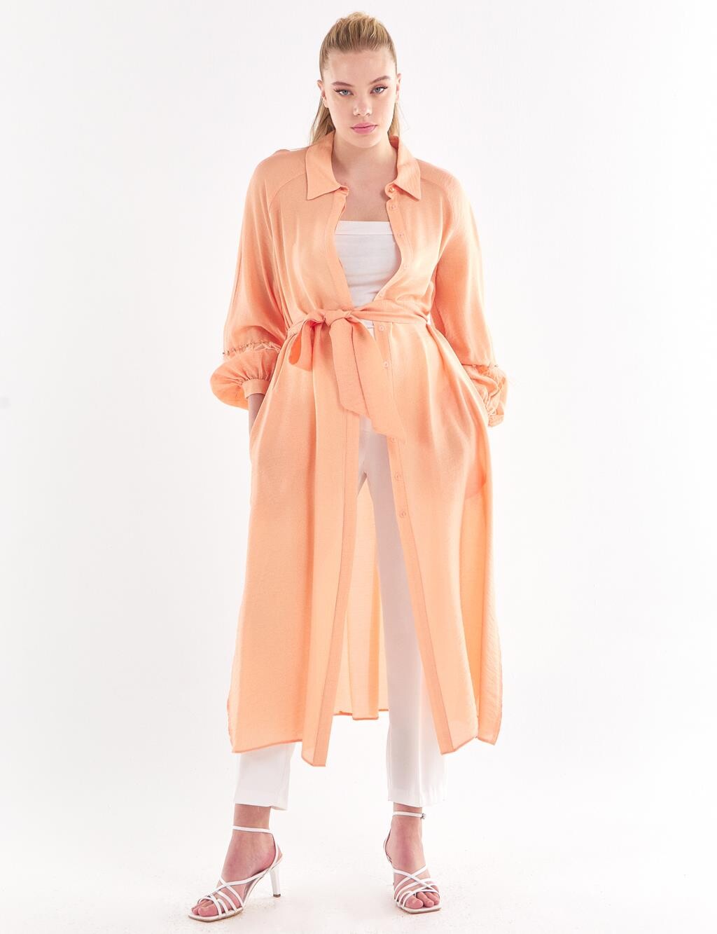 Туника с кисточками и вышивкой камнями персикового цвета Kayra
Туника с кисточками и вышивкой камнями персикового цвета Kayra