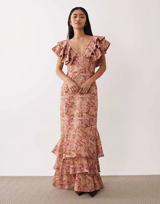 Платье макси с оборками и v-образным вырезом Pretty Lavish из смесового льна с абстрактным ягодным принтом
Платье макси с оборками и v-образным вырезом Pretty Lavish из смесового льна с абстрактным ягодным принтом