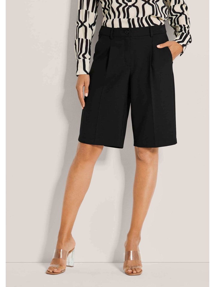 MADELEINE Черные бермуды со складками
MADELEINE Черные бермуды со складками