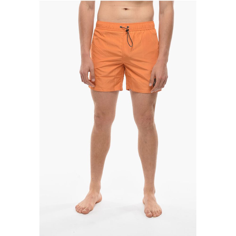 Однотонные шорты для плавания RUE ST-GUILLAME с 3 карманами Karl Lagerfeld, Orange
Однотонные шорты для плавания RUE ST-GUILLAME с 3 карманами Karl Lagerfeld, Orange