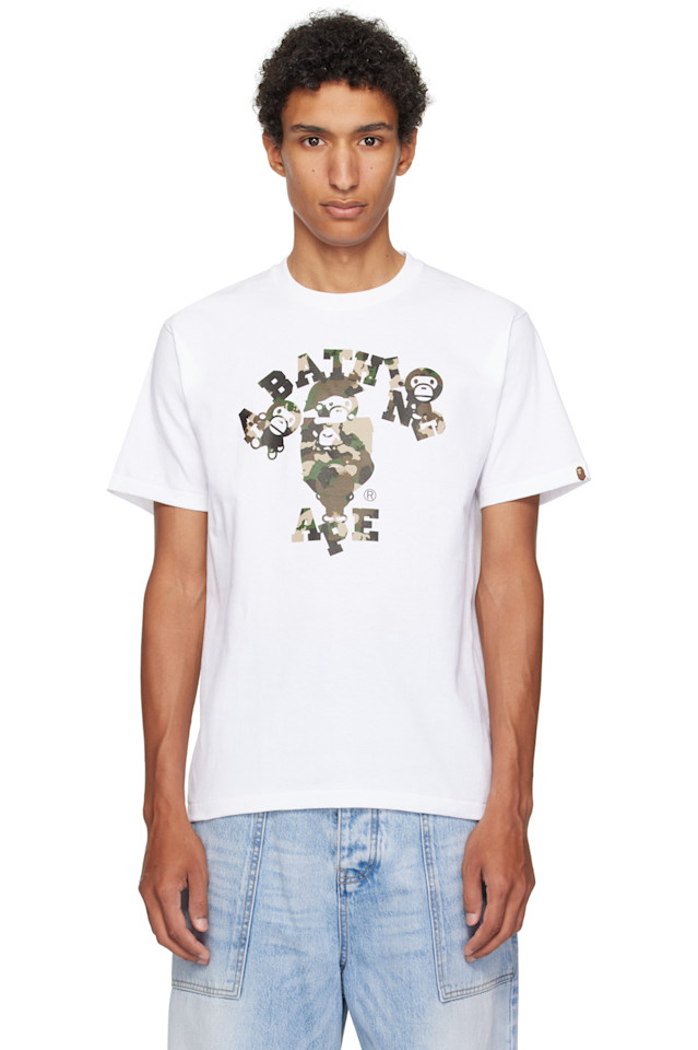 Bape Белая камуфляжная футболка с изображением карты и надписью College Milo
Bape Белая камуфляжная футболка с изображением карты и надписью College Milo