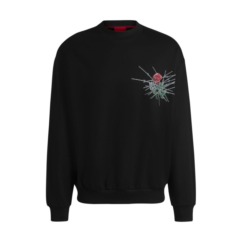 Свитшот свободного кроя из хлопчатобумажной махры с сезонными принтами HUGO, черный
Свитшот свободного кроя из хлопчатобумажной махры с сезонными принтами HUGO, черный