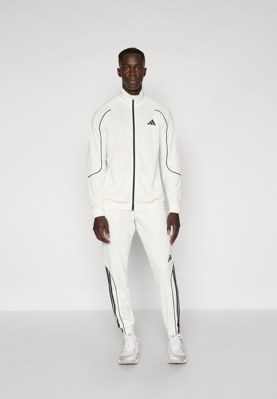 Спортивный костюм Adidas Sportswear STADIUM SET, Off White/Black/Off-White
Спортивный костюм Adidas Sportswear STADIUM SET, Off White/Black/Off-White