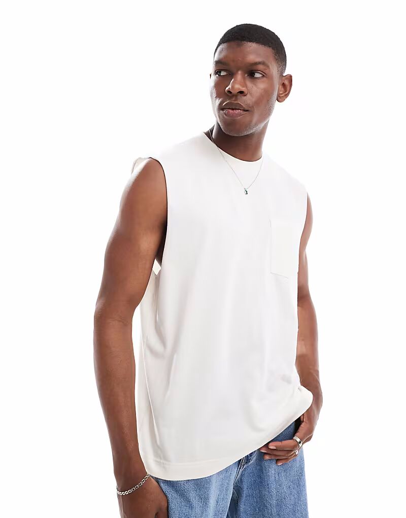 Майка Hollister с объемными карманами бежевого цвета
Майка Hollister с объемными карманами бежевого цвета