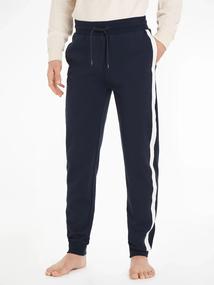 Спортивные брюки Tommy Hilfiger Underwear "HWK TRACK PANT" с полосками с логотипом по бокам, цвет Desert Sky
Спортивные брюки Tommy Hilfiger Underwear "HWK TRACK PANT" с полосками с логотипом по бокам, цвет Desert Sky
