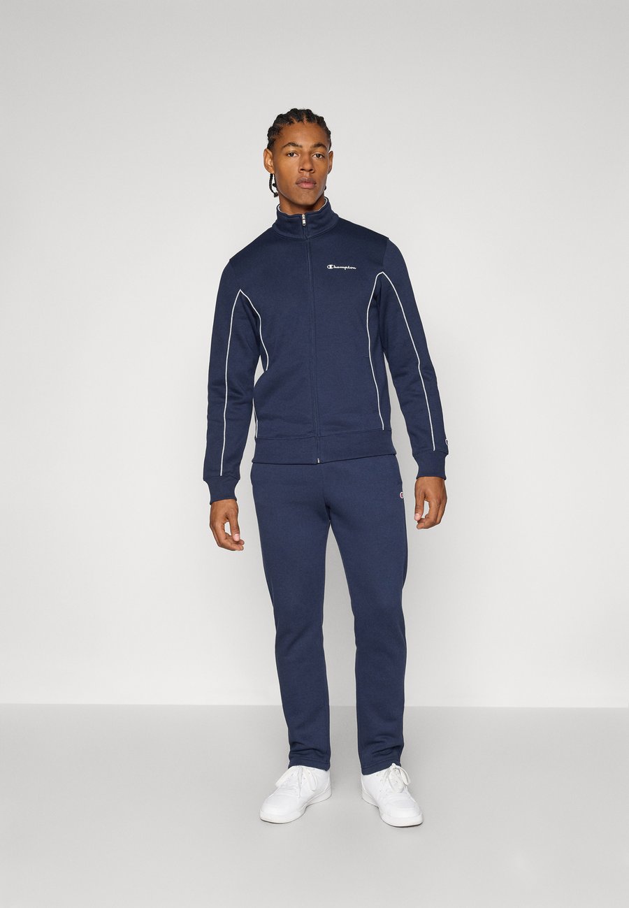 Спортивный костюм Champion SWEATSUIT SET, Navy/Dark Blue
Спортивный костюм Champion SWEATSUIT SET, Navy/Dark Blue