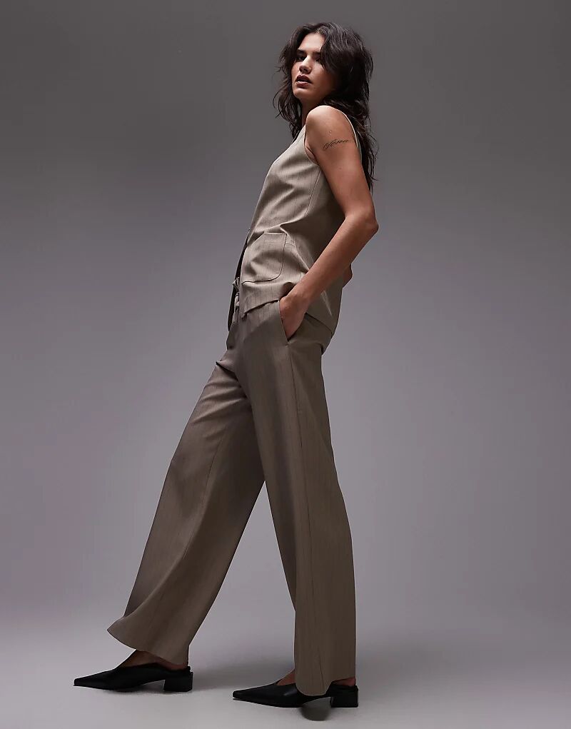 Джоггеры с завязками спереди в серо-коричневую полоску Topshop
Джоггеры с завязками спереди в серо-коричневую полоску Topshop