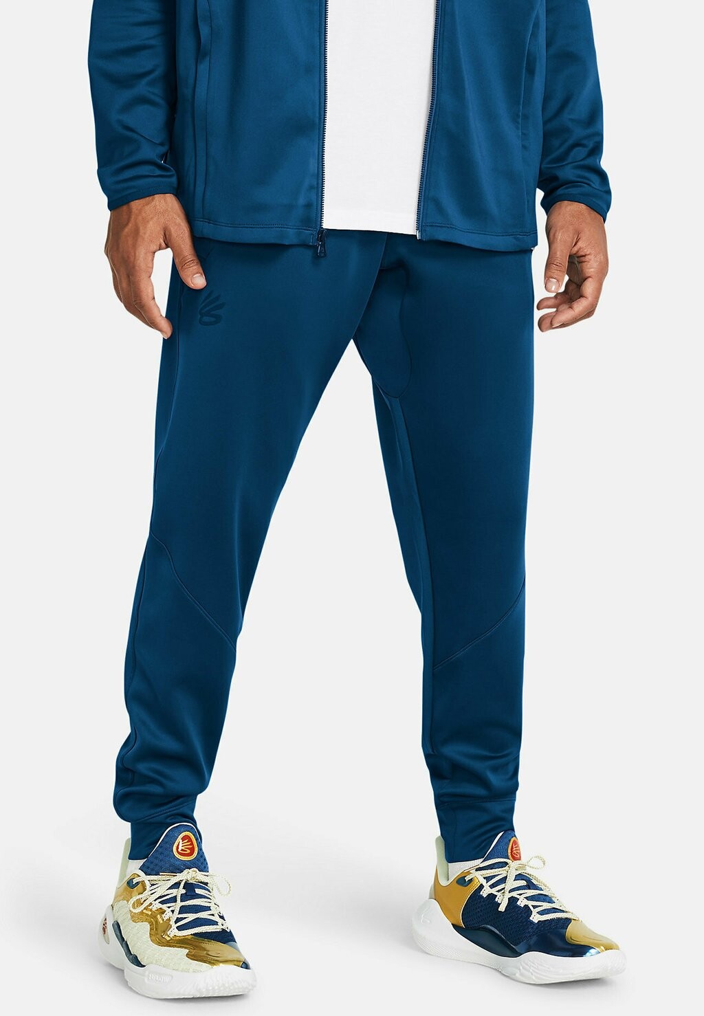 Брюки для бега WARMUP CURRY PLAYABLE Under Armour, цвет varsity blue
Брюки для бега WARMUP CURRY PLAYABLE Under Armour, цвет varsity blue