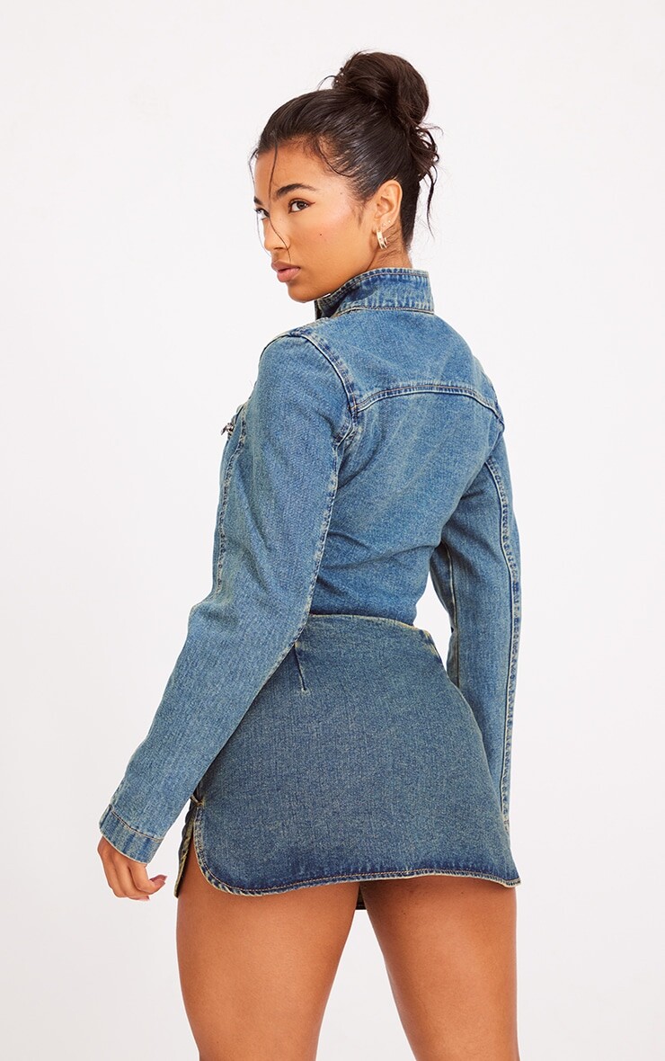 PrettyLittleThing Джинсовая куртка Indigo Vintage Wash с байкерской деталью и изогнутым краем
PrettyLittleThing Джинсовая куртка Indigo Vintage Wash с байкерской деталью и изогнутым краем