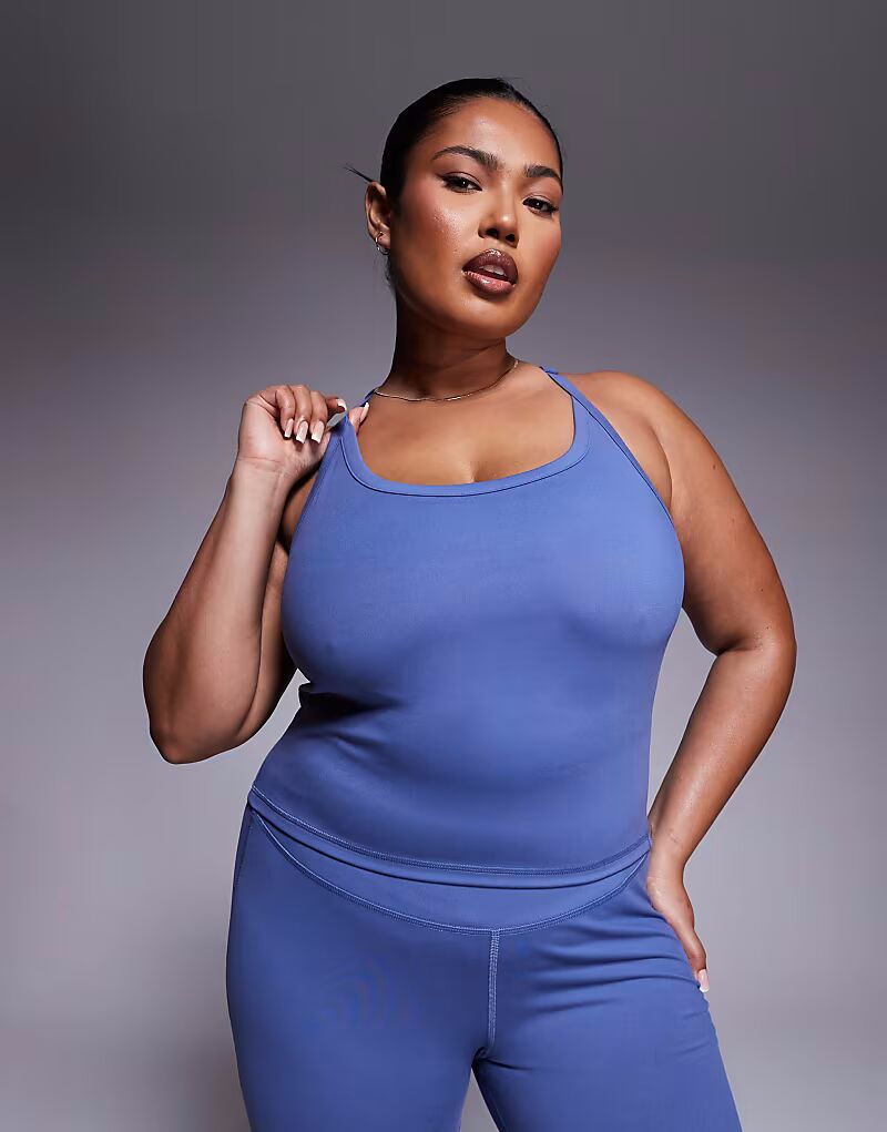 4505 Curve Icon мягкий топ для йоги с внутренним бюстгальтером и регулируемыми бретелями в цвете «китайский синий»
4505 Curve Icon мягкий топ для йоги с внутренним бюстгальтером и регулируемыми бретелями в цвете «китайский синий»
