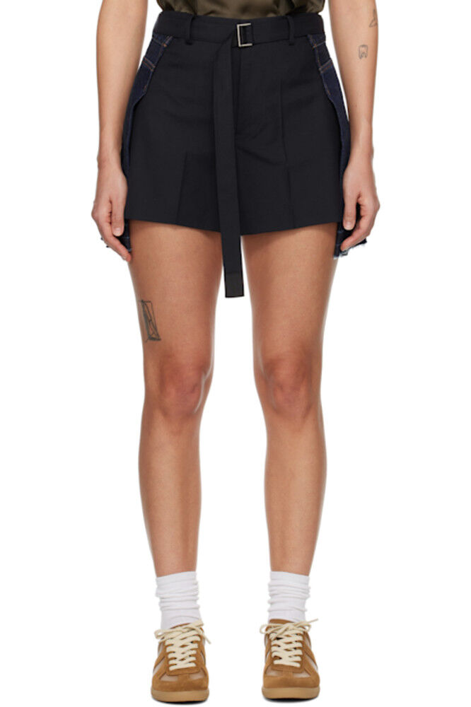 Шорты из денима с темно-синими и синими вставками sacai
Шорты из денима с темно-синими и синими вставками sacai