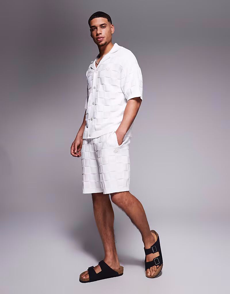 Трикотажные шорты в клетку от Couture Club в бежевом цвете The Couture Club
Трикотажные шорты в клетку от Couture Club в бежевом цвете The Couture Club