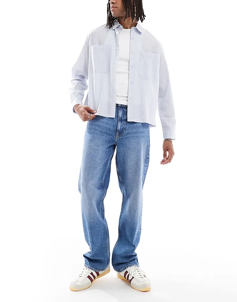 Джинсы Lee Asher свободного прямого кроя, средне-синего цвета
Джинсы Lee Asher свободного прямого кроя, средне-синего цвета