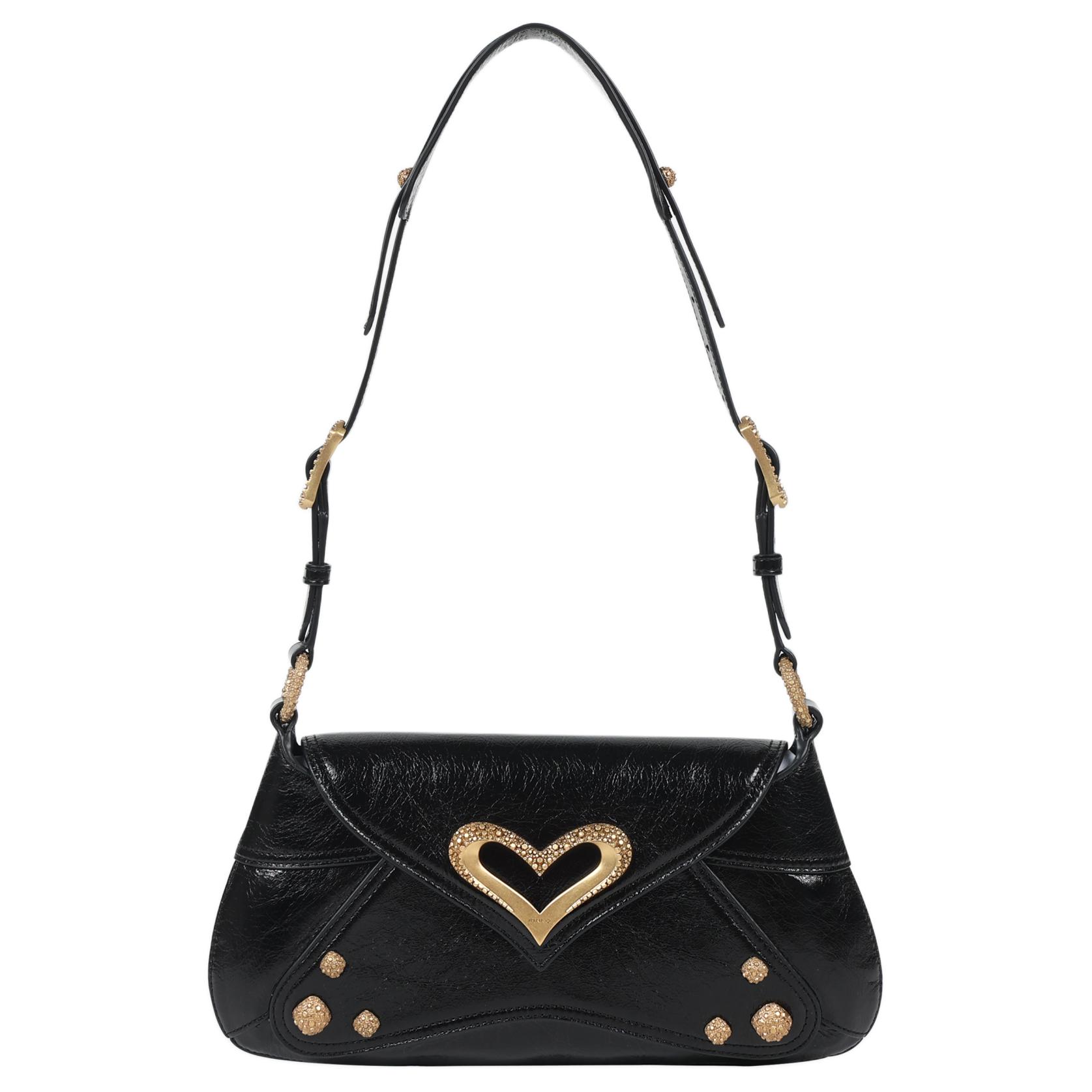 Кожаная женская сумка через плечо черного и шоколадного цвета с золотом PINKO
Кожаная женская сумка через плечо черного и шоколадного цвета с золотом PINKO