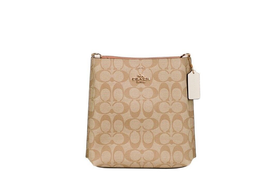 Сумка-ведро через плечо Mollie 22 Small Light Khaki с покрытием из парусины Coach
Сумка-ведро через плечо Mollie 22 Small Light Khaki с покрытием из парусины Coach