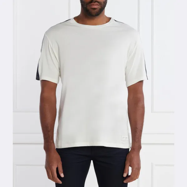 Футболка стандартного кроя из нержавеющей стали с логотипом Tommy Hilfiger, экрю
Футболка стандартного кроя из нержавеющей стали с логотипом Tommy Hilfiger, экрю