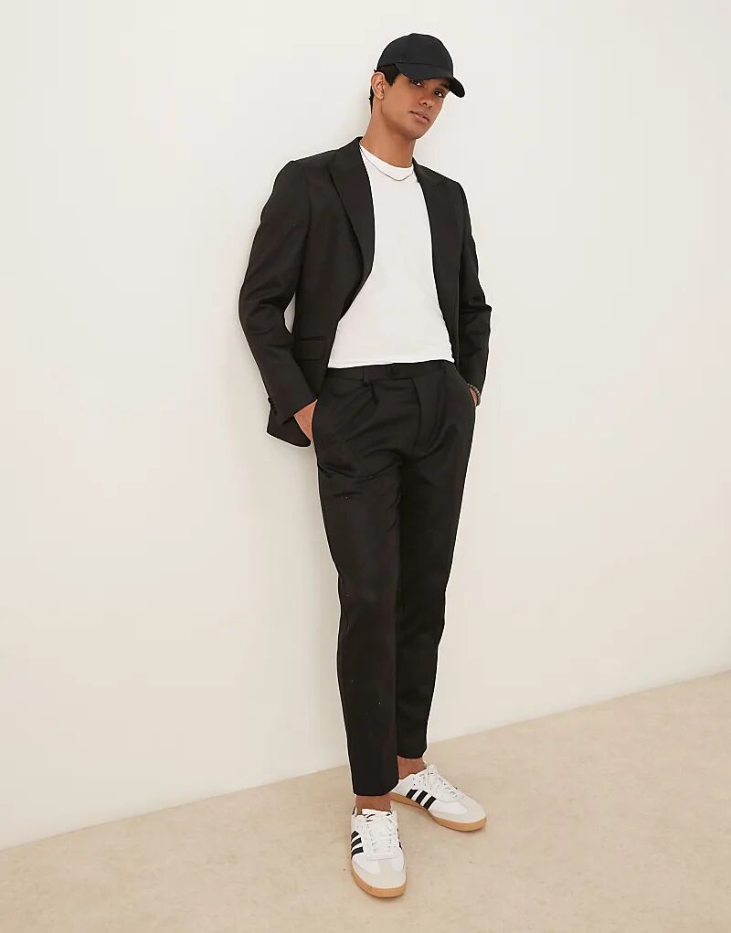 Зауженные брюки ASOS DESIGN из костюмной ткани с льном черного блестящего цвета
Зауженные брюки ASOS DESIGN из костюмной ткани с льном черного блестящего цвета