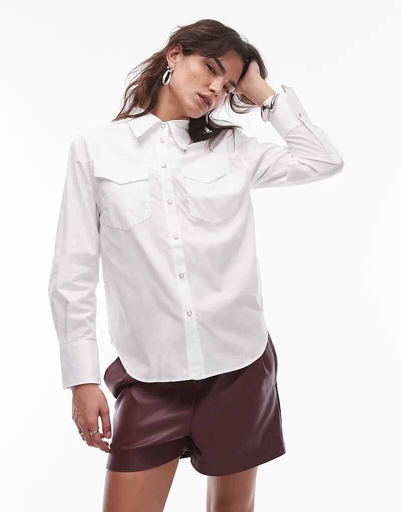 Рубашка в стиле вестерн с воротником-стойкой белого цвета Mango
Рубашка в стиле вестерн с воротником-стойкой белого цвета Mango