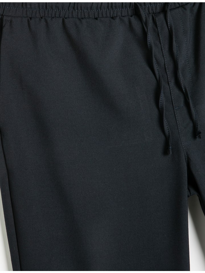 Брюки темно-синего цвета KOTON
Брюки темно-синего цвета KOTON