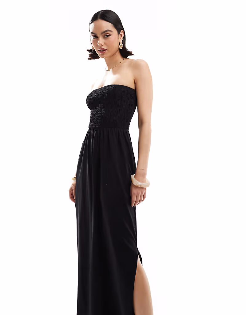 Потертое платье-бандо миди с присборенной грудью черного цвета Threadbare
Потертое платье-бандо миди с присборенной грудью черного цвета Threadbare