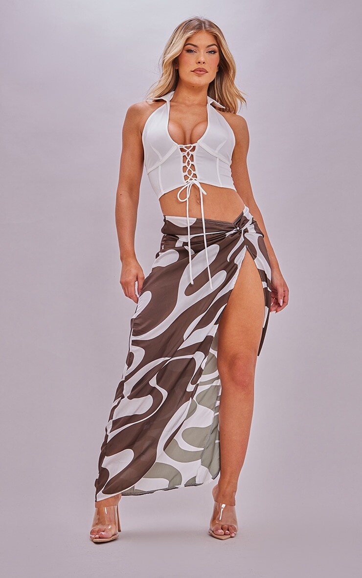PrettyLittleThing Атласная юбка мидакси с завязками по бокам и шоколадным принтом
PrettyLittleThing Атласная юбка мидакси с завязками по бокам и шоколадным принтом