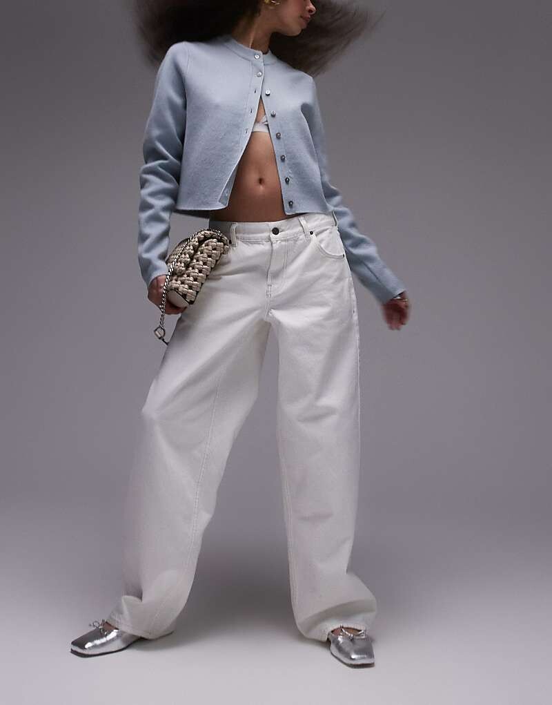 Topshop – джинсы кремового цвета с низкой посадкой и лямкой сзади
Topshop – джинсы кремового цвета с низкой посадкой и лямкой сзади