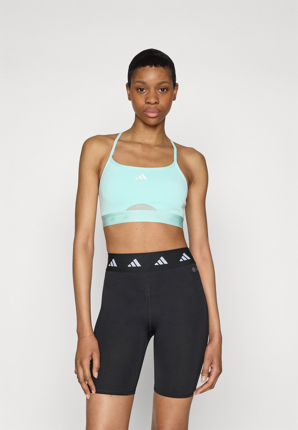 Спортивный бюстгальтер с легкой поддержкой HYPERGLAM BRALETTE Adidas Performance, бирюзовый
Спортивный бюстгальтер с легкой поддержкой HYPERGLAM BRALETTE Adidas Performance, бирюзовый