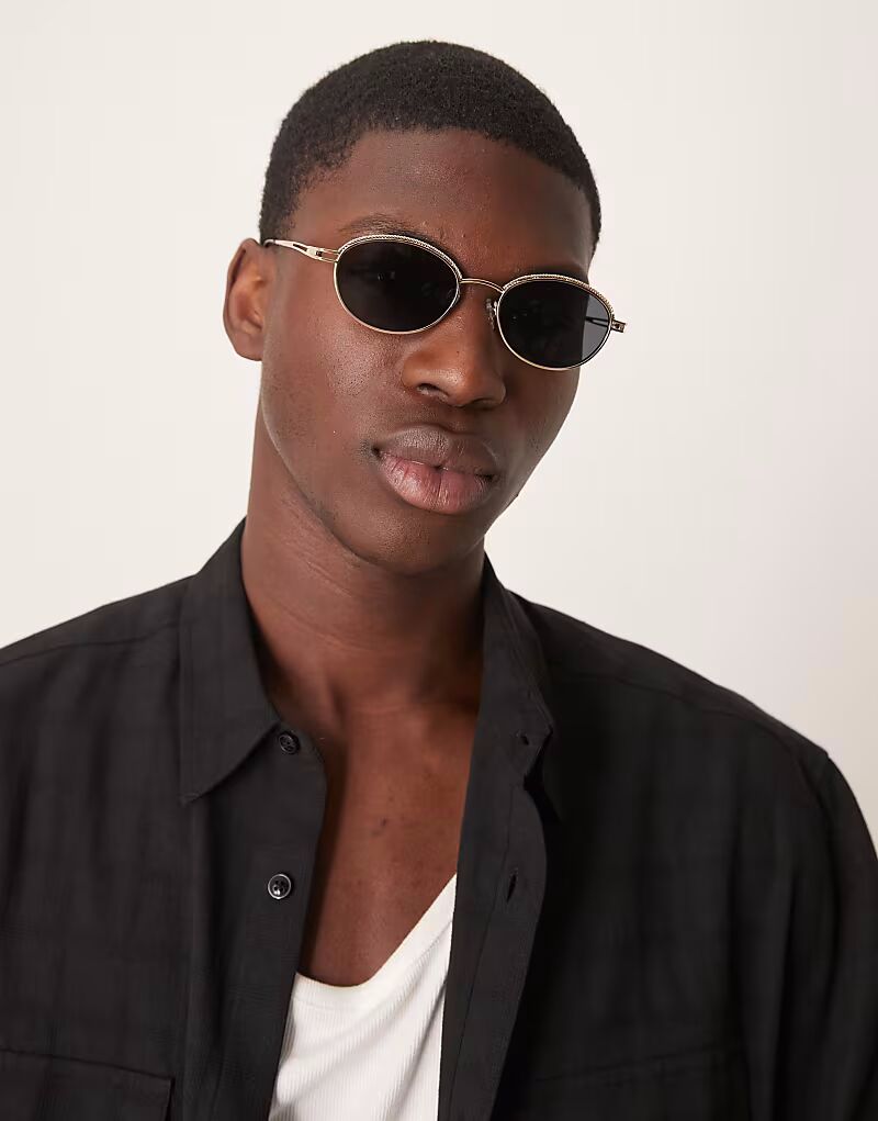 Круглые солнцезащитные очки ASOS DESIGN с дымчатыми линзами и оправой из золотистого металла
Круглые солнцезащитные очки ASOS DESIGN с дымчатыми линзами и оправой из золотистого металла