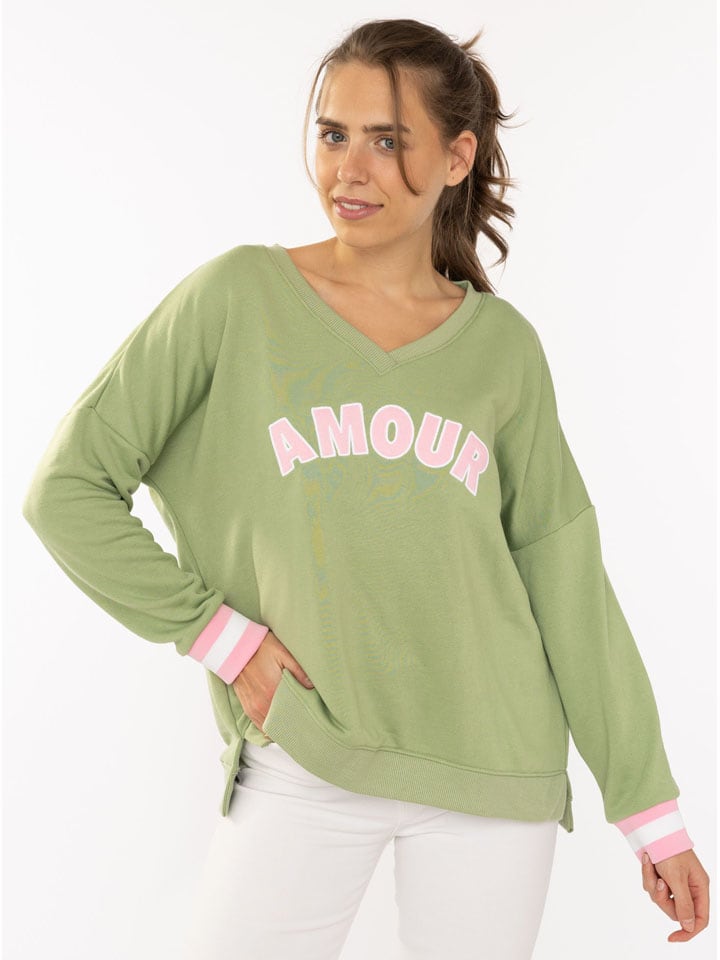 Zwillingsherz Свитер "Amour" в зелено-розовом цвете
Zwillingsherz Свитер "Amour" в зелено-розовом цвете