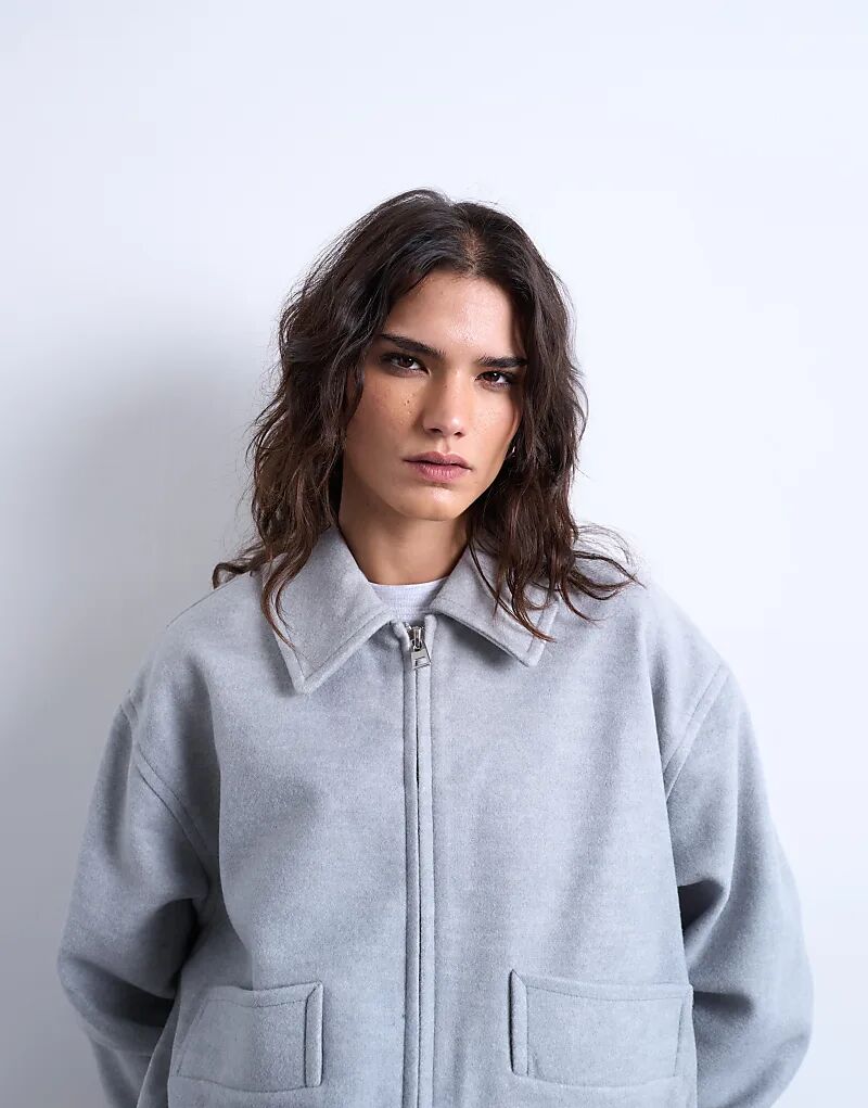 Укороченный стеганый бомбер Topshop на подкладке из шерсти светло-серого цвета
Укороченный стеганый бомбер Topshop на подкладке из шерсти светло-серого цвета