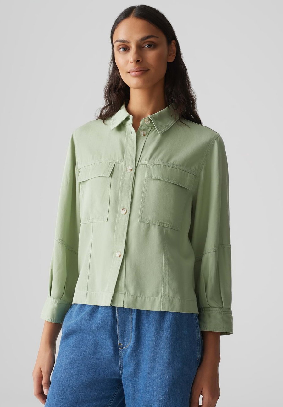 Блуза OPUS Button-down blouse, Green Glow/Light Green
Блуза OPUS Button-down blouse, Green Glow/Light Green