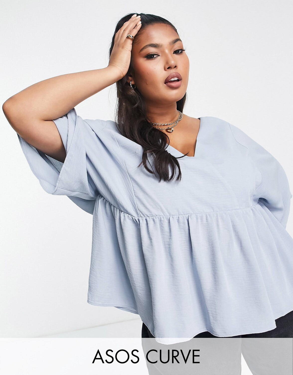 Голубой топ с запахом, рукавами ангела и подолом с баской ASOS DESIGN Curve
Голубой топ с запахом, рукавами ангела и подолом с баской ASOS DESIGN Curve