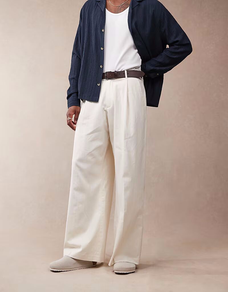 Брюки свободного покроя из льняной смеси ASOS DESIGN белого цвета со складками спереди
Брюки свободного покроя из льняной смеси ASOS DESIGN белого цвета со складками спереди