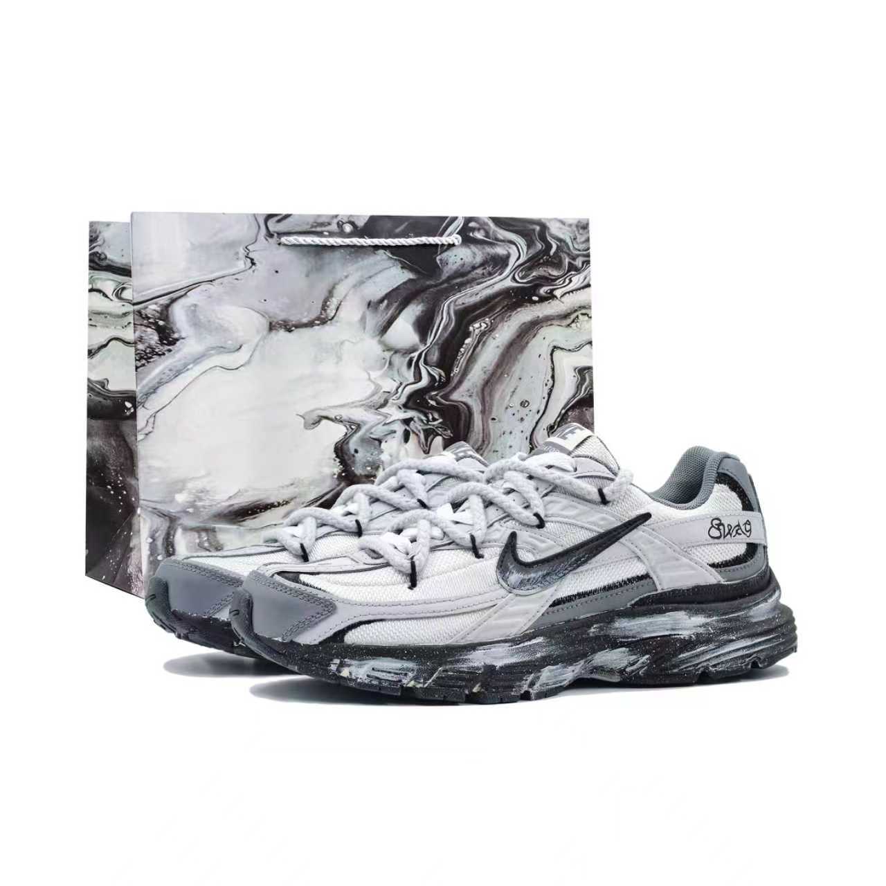 Nike Кроссовки мужские Casual низкие Initiator Ink Splatter Ark серые
Nike Кроссовки мужские Casual низкие Initiator Ink Splatter Ark серые