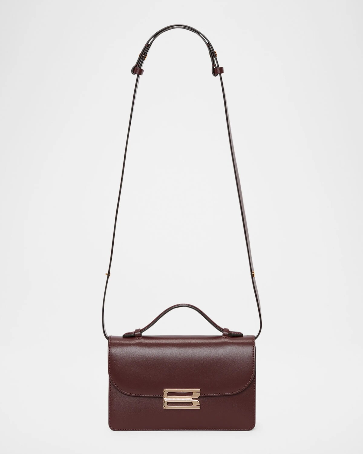 Миниатюрная кожаная сумка через плечо с пряжкой и клапаном Victoria Beckham, цвет Burgundy
Миниатюрная кожаная сумка через плечо с пряжкой и клапаном Victoria Beckham, цвет Burgundy