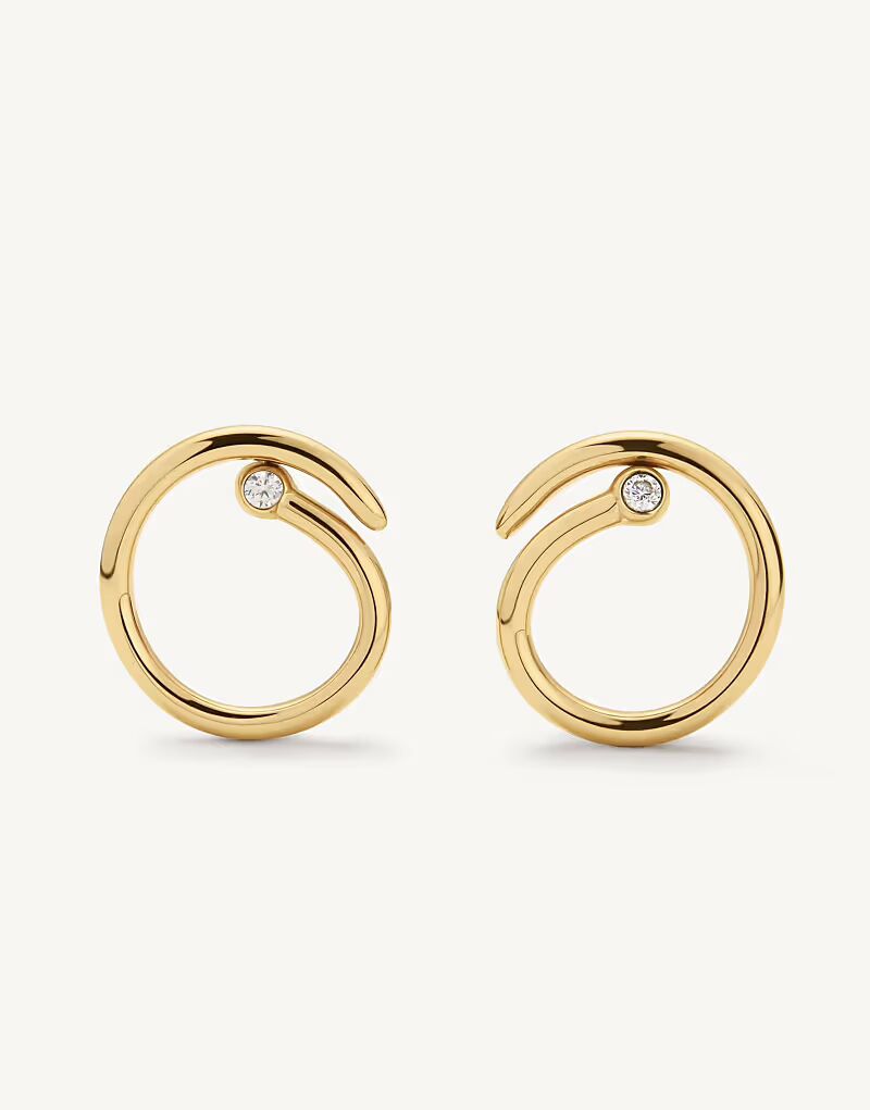 Волнистые серьги-гвоздики из золота D. Louise
Волнистые серьги-гвоздики из золота D. Louise