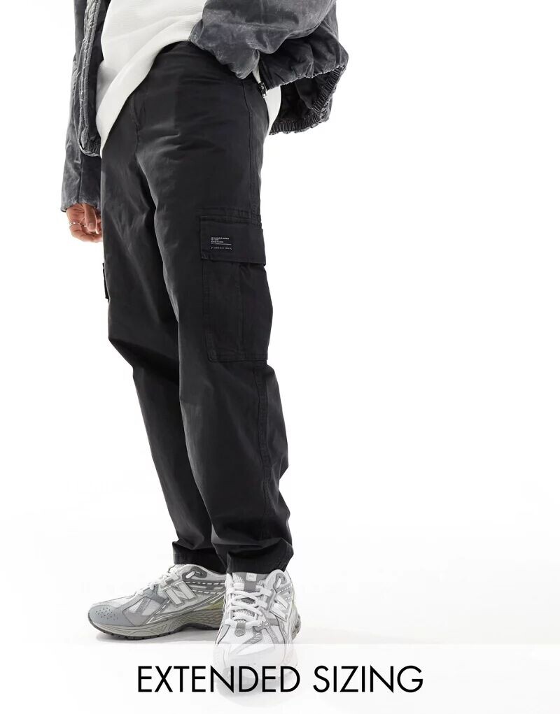 Черные зауженные брюки-карго оверсайз с нашивкой ASOS
Черные зауженные брюки-карго оверсайз с нашивкой ASOS