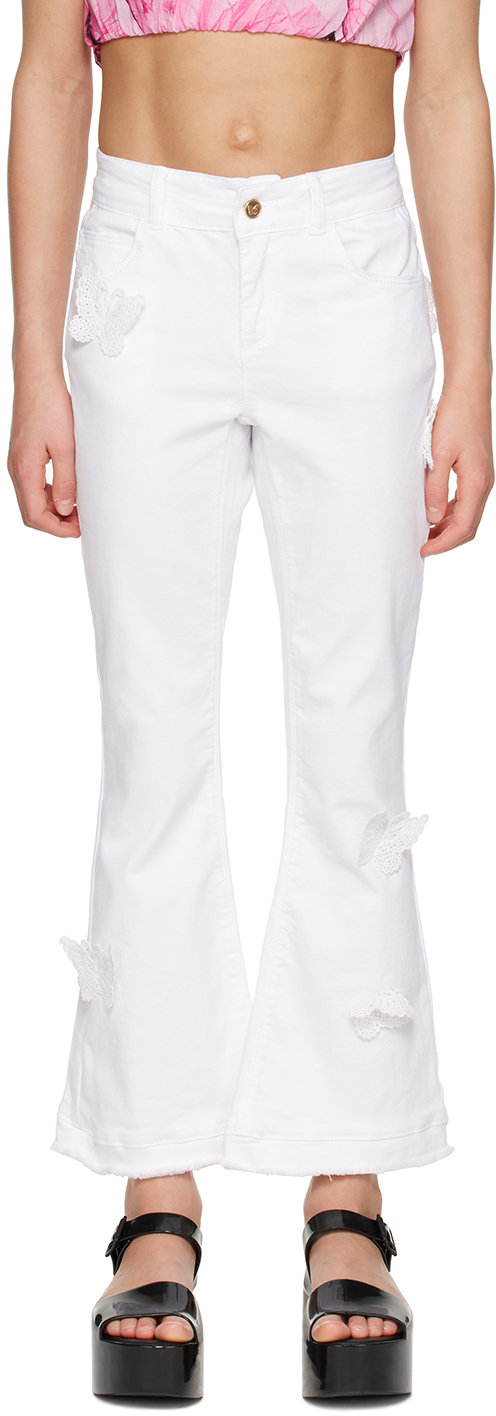 Детские белые джинсы с аппликацией Miss Blumarine 
Детские белые джинсы с аппликацией Miss Blumarine