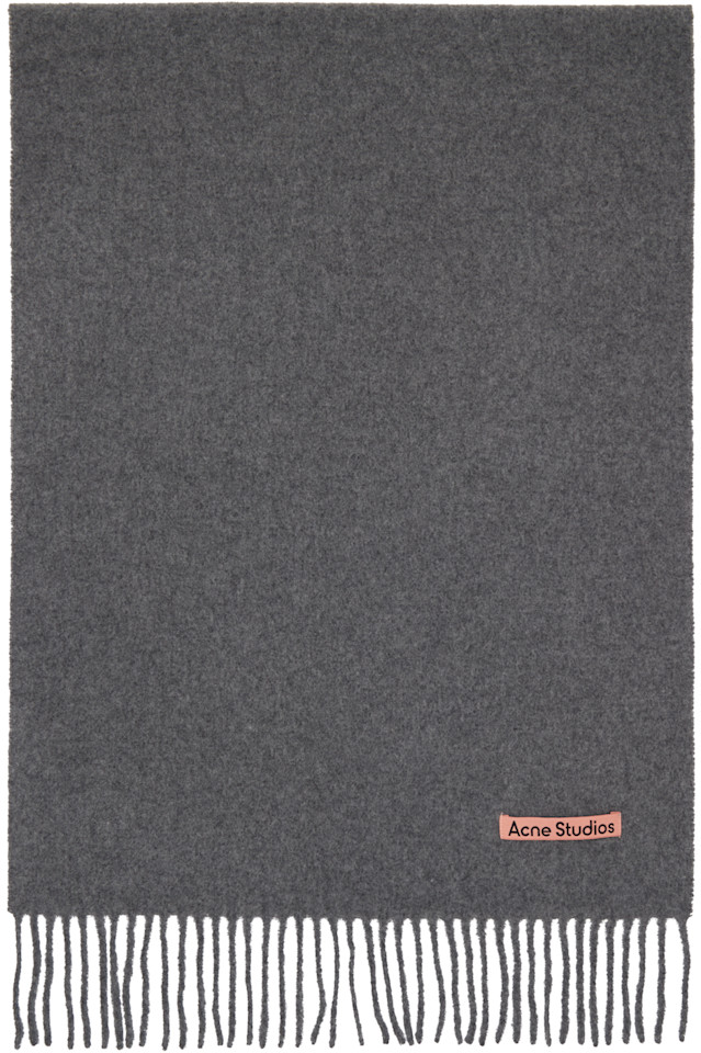 Acne Studios Узкий серый шерстяной шарф с бахромой
Acne Studios Узкий серый шерстяной шарф с бахромой