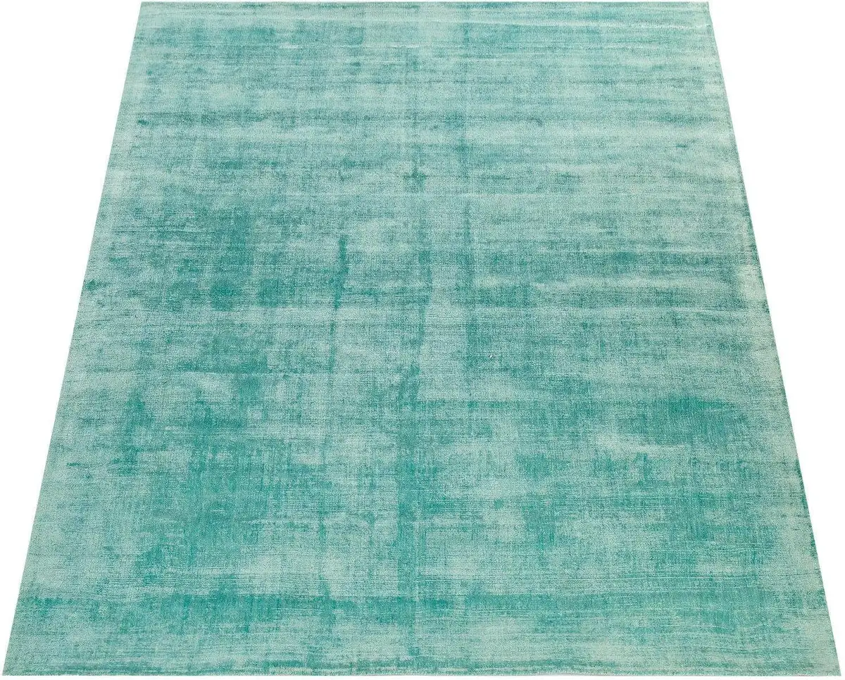 Ковер Paco Home "Glori 330", прямоугольный, ручное плетение, короткий ворс, 100% вискоза, ручное плетение, с легким отливом 160х230 см, светло-зеленый
Ковер Paco Home "Glori 330", прямоугольный, ручное плетение, короткий ворс, 100% вискоза, ручное плетение, с легким отливом 160х230 см, светло-зеленый