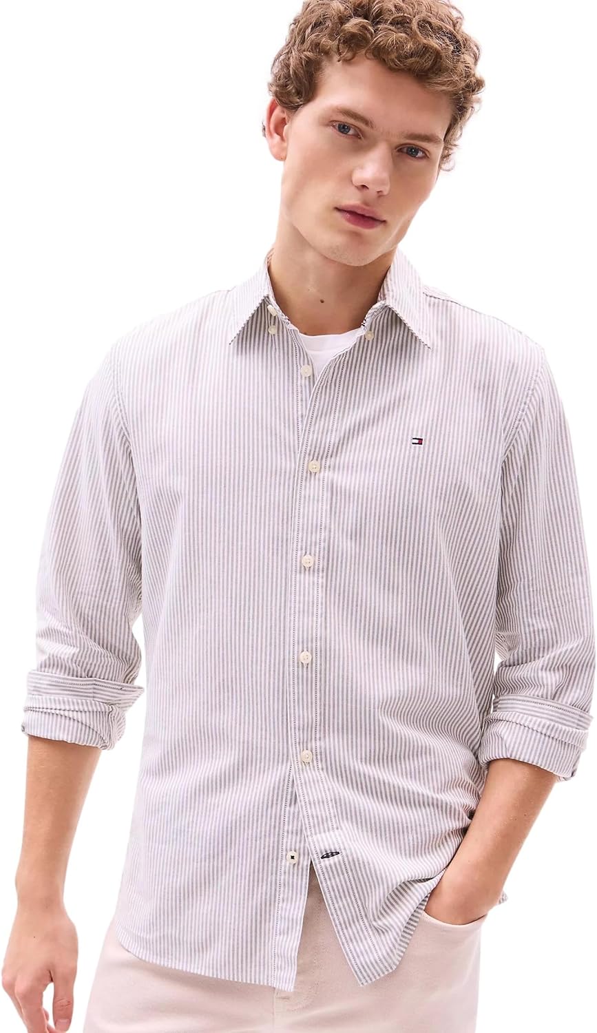 Мужская фирменная рубашка TOMMY HILFIGER с длинным рукавом и застежкой на пуговицы, классического кроя, коллекция 2025 года, Stripped Uniform Olive.
Мужская фирменная рубашка TOMMY HILFIGER с длинным рукавом и застежкой на пуговицы, классического кроя, коллекция 2025 года, Stripped Uniform Olive.