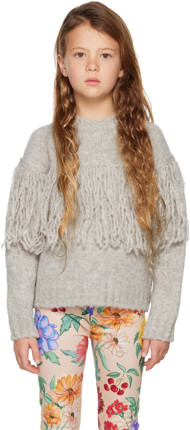 Детский серый свитер с бахромой Maison Mangostan
Детский серый свитер с бахромой Maison Mangostan