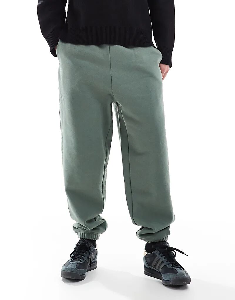 Премиальные плотные свободные джоггеры плотностью 400 г/м² в средне-зеленом цвете ASOS DESIGN
Премиальные плотные свободные джоггеры плотностью 400 г/м² в средне-зеленом цвете ASOS DESIGN