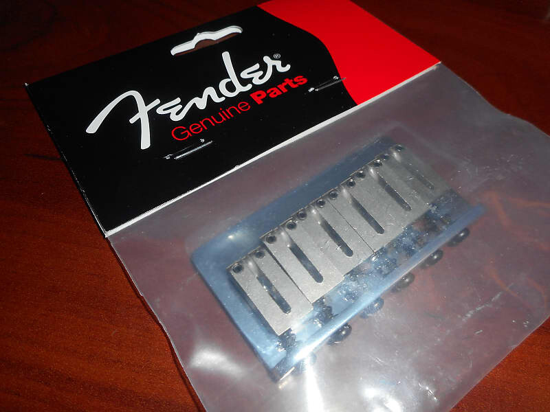 Оригинальный страт-бридж Fender American Standard, CHROME, 003-2909-049
Оригинальный страт-бридж Fender American Standard, CHROME, 003-2909-049
