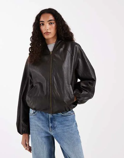 ASOS DESIGN Tall washed leather look oversized bomber jacket in brown
ASOS DESIGN Tall washed leather look oversized bomber jacket in brown