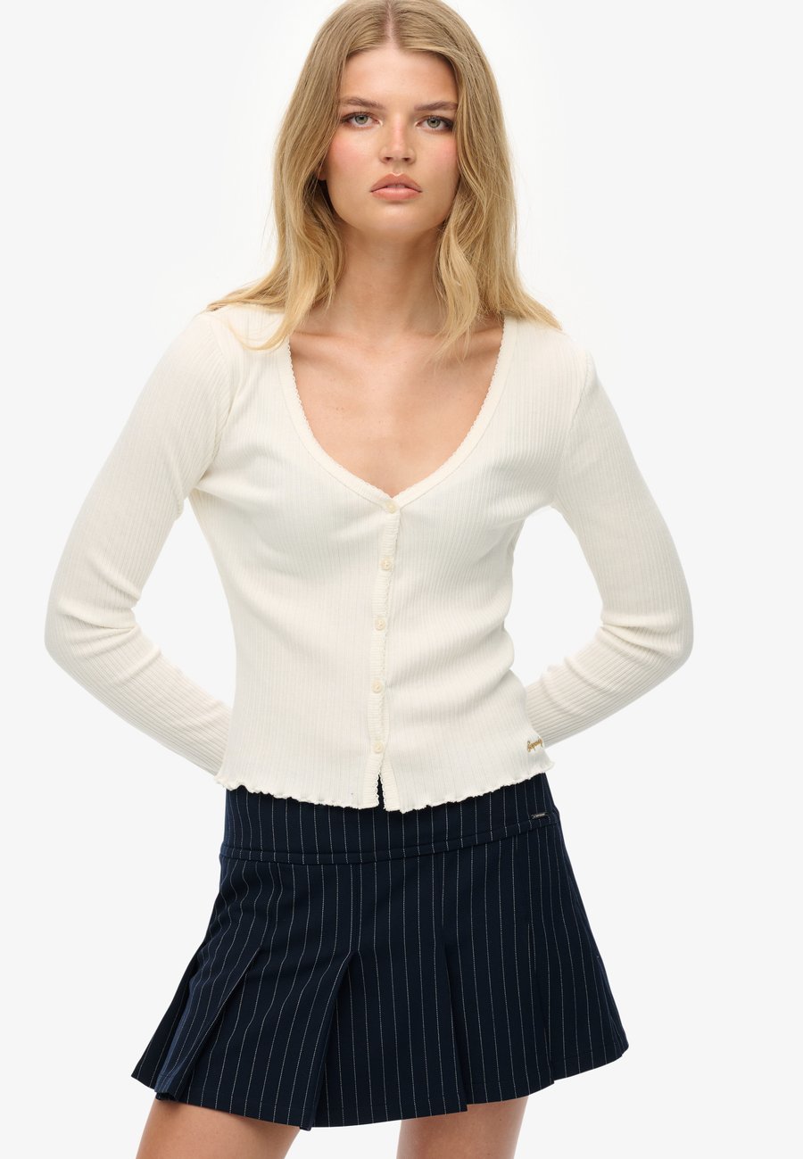 Кардиган Superdry & Co ESSENTIAL BUTTON THROUGH LONG SLEEVE, Off White/White
Кардиган Superdry & Co ESSENTIAL BUTTON THROUGH LONG SLEEVE, Off White/White