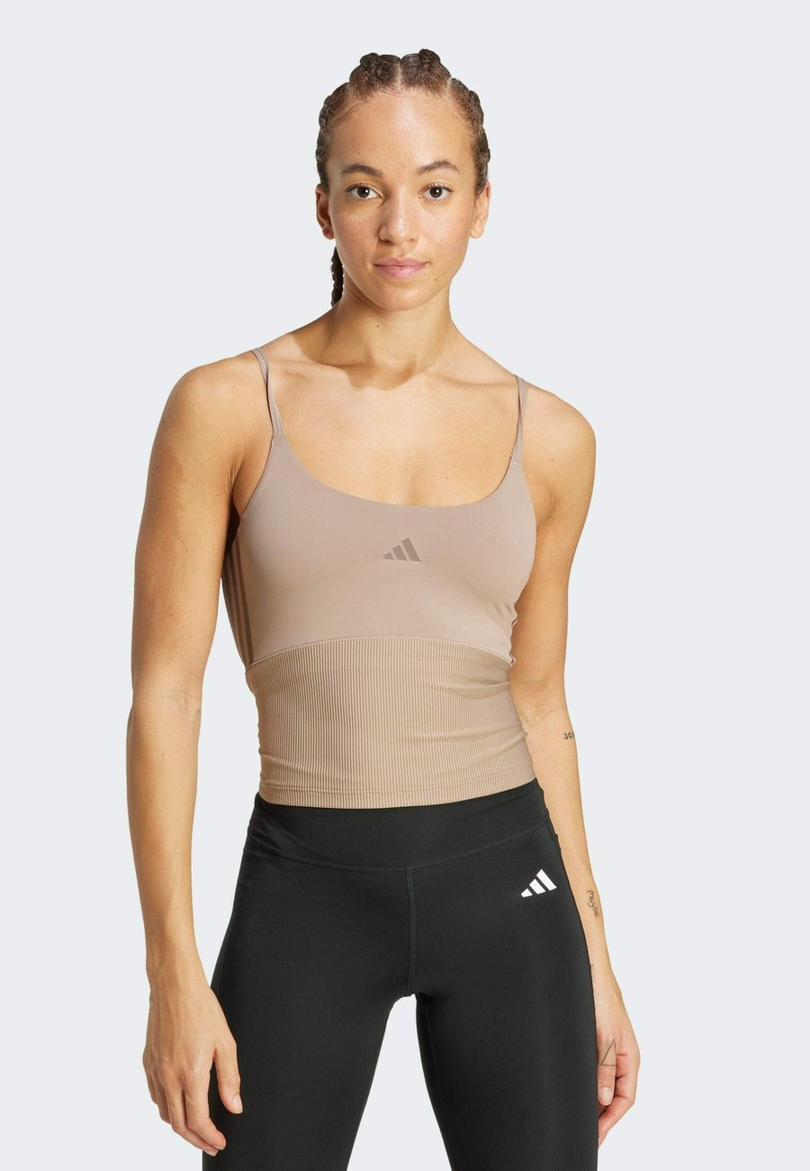 Топ Adidas Performance HYPERGLAM TANK, Chalky Brown Earth Strata/Brown
Топ Adidas Performance HYPERGLAM TANK, Chalky Brown Earth Strata/Brown