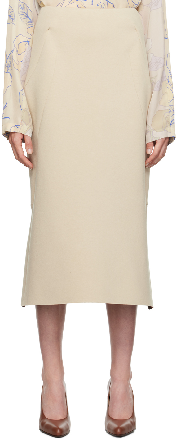 Юбка миди из бежевого неопрена Dries Van Noten
Юбка миди из бежевого неопрена Dries Van Noten